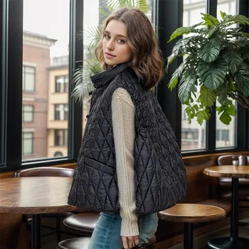 Dámská vesta Dámská zimní vesta – prošívaná, bez rukávů, retro styl Barva: Černá, Velikost: M