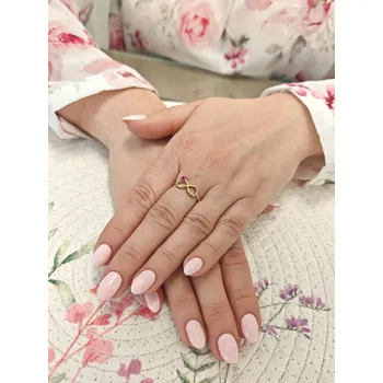 Prsten Zlatý dámský prsten nekonečno se sdrcem Velikost prstenu: 53, Váha: 1,85 g, Ryzost: 14kt (585/1000)