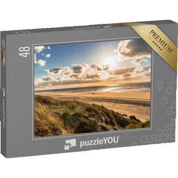 Puzzle puzzle 48 dílků „Divoké pobřeží Severního moře s dramatickou oblohou, Holandsko“