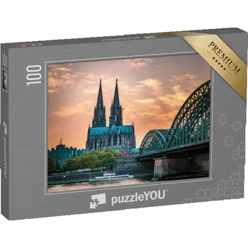Puzzle puzzle 100 dílků „Kolínská katedrála a Hohenzollernský most v Kolíně nad Rýnem večer, Německo“