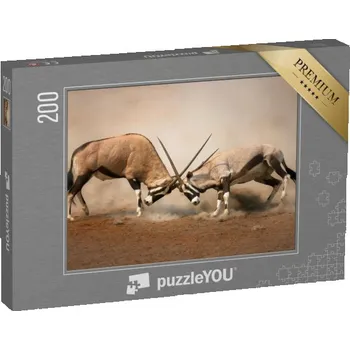 Puzzle puzzle 200 dílků „Souboj dvou samců gemsboka“