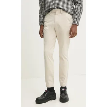 Dámské kalhoty Kalhoty Tommy Jeans DM0DM20282 béžová 12X, vel. 34/34