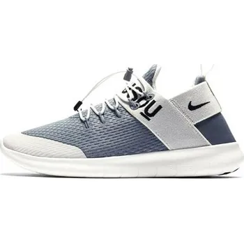 Dámská běžecká obuv Dámská běžecká obuv Nike FREE RN Commuter 2017 GYKS - Dámské boty jsou ideální pro běhání a díky decentnímu vzhledu i na nošení do práce. Tato obuv simuluje běh naboso (tzv. barefoot), který je přirozenější a přispívá lymfatickému systému i pohybovému apa