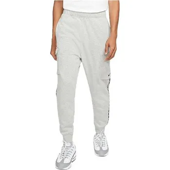 Pánské tepláky Nike Sportswear Fleece Cargo - Pánské volnočasové teplákové kalhoty od značky Nike, šedé provedení. - 3470020