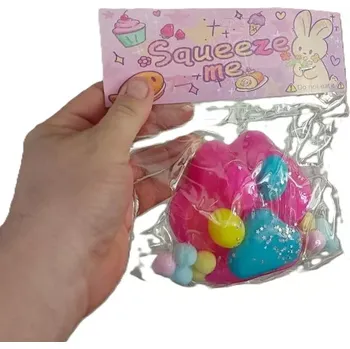 Relaxační silikonová tlapka Squeezy - růžová/multikolor