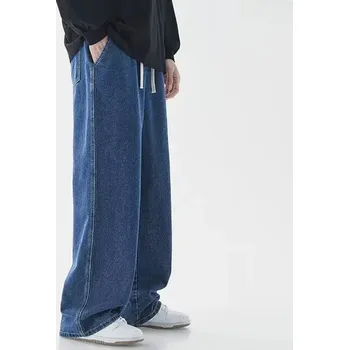 Pánské džíny Pánské džíny s rovnými nohavicemi a elastickým pasem Barva: Tmavě Modrá, Velikost: L