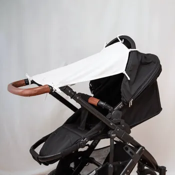 Příslušenství pro přepravu dětí Sluneční clona UV 50+ do kočárku dětská bílá Geggamoja