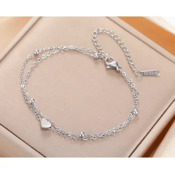 Řetízek B-TOP Dvouvrstvý řetízek na nohu z nerezové oceli se srdcem a perličkami Stříbrná