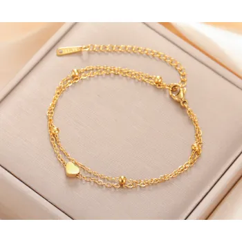 Řetízek B-TOP Dvouvrstvý řetízek na nohu z nerezové oceli se srdcem a perličkami Druh barvy: Zlatá