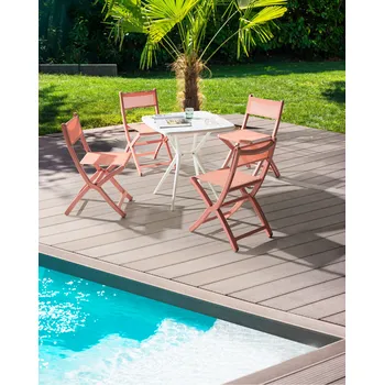 Sada 4 jídelních židlí korálová plastová vnitřní venkovní stohovací zahrada bez područek minimalistický styl Beliani