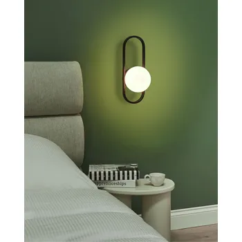 Nástěnné svítidlo Nástěnná lampa černá kovová základna neprůhledné skleněné stínidlo geometrický tvar moderní styl obývací pokoj ložnice Beliani