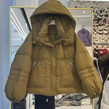 Dámská parka Dámská zimní bunda s kapucí a volným střihem Barva: Khaki, Velikost: S