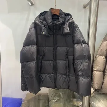 Dámská parka péřová bunda s kapucí a elegantním prošíváním Barva: Černá, Velikost: L