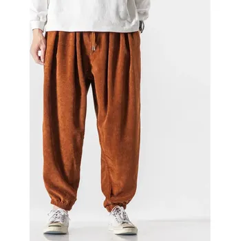 Pánské kalhoty Pánské široké kalhoty s nízkým sedem Velikost: M, Barva (Varianta): Hnědá