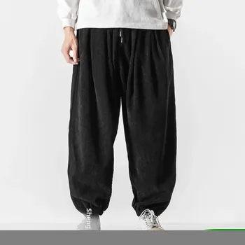 Pánské kalhoty Pánské široké kalhoty s nízkým sedem Velikost: L, Barva (Varianta): Černá