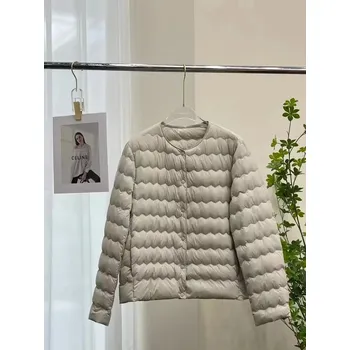 Dámská softshellová bunda Dámská péřová bunda s husím peřím a kulatým výstřihem Barva: Šedá, Velikost: M