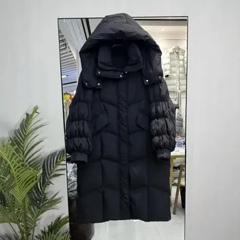 Dámská parka Dlouhá dámská bunda s kapucí a silnou výplní Barva: Černá, Velikost: M