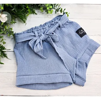 Dívčí kraťasy Kulišárny Dívčí šortky s mašlí mušelín POWDER BLUE VELIKOST: 128