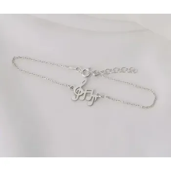 Náramek na ruku - houslový klíč a noty