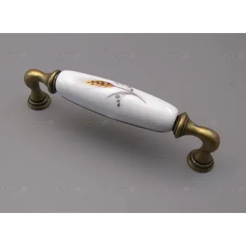 Nábytkové kování rustikální úchytka 128mm 15136K1285B.09 klásek