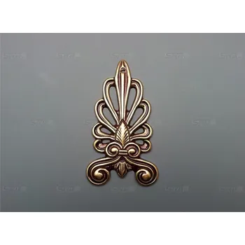 Nábytkové kování 45245.08000.54 mosazná ozdoba