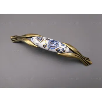 Nábytkové kování M94K12884.09 úchytka s porcelánem 128mm