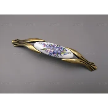 Nábytkové kování M94K1285P.09 úchytka s porcelánem 128mm