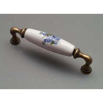 Nábytkové kování rustikální úchytka 128mm 15136K12854.09