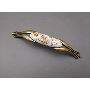 Nábytkové kování M94K12889.09 úchytka s porcelánem 128mm