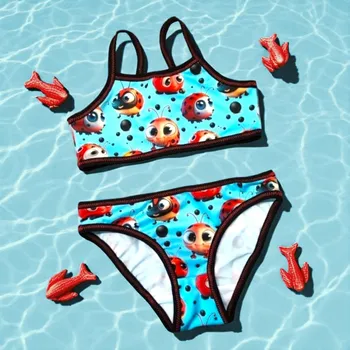 Dívčí plavky Dvoudílné dívčí plavky berušky na modré Velikost: 110/116 Dětské plavky