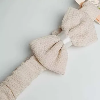 Látková čelenka zdobená mašlí - béžová