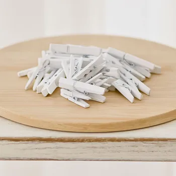 Vánoční dekorace ROSA Dřevěné kolíčky 72 mm bílé 25 ks M