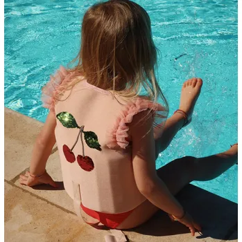 Plovací vesta Konges Slojd Plovací vesta s flitry a tylovými volánky Gemma Evening Sand Velikost: 2-3 roky (15-19 kg) Konges Sløjd Gemma Swim Vest