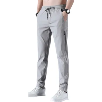 Pánské kalhoty Pánské prodyšné elastické kalhoty s rovným střihem Ležérní pohodlné kalhoty na každodenní nošení Volný pas Stylové vzdušné kalhoty šedá M