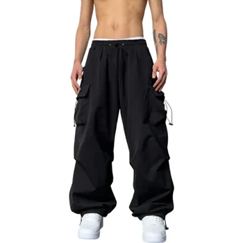 Pánské kalhoty Letní černé pánské cargo kalhoty Široké nohavice Elastický pas Prodyšný materiál Volný střih Streetwear Pohodlné kapsáče S