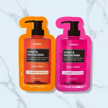 Tělové mléko VZOREK - KUNDAL - Jemný sprchový gel s medem a Vyživující, hydratační tělové mléko s medem s vůní CHERRY BLOSSOM - 10 ml