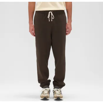 Pánské kalhoty Pánské kalhoty New Balance MADE in USA MP43547RHE – hnědý