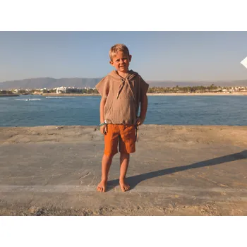 Chlapecké kraťasy Nelly Dětské kraťasy ze 100% lnu - oranžové velikost: 128