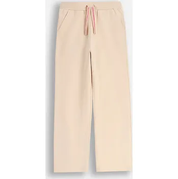 Dětské tepláky béžové dívčí široké vel. 134 Coccodrillo ZC5