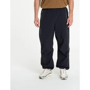 Pánské kalhoty Kalhoty Nike Tech Men's Woven Oversized Pants Black/ Black/ Black L