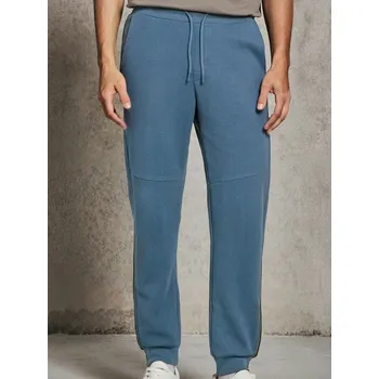 Sinsay - Kalhoty joggers - modrá - 016EV-58X - 016EV-58X-XS