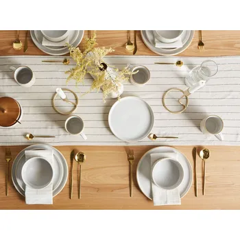 Sada nádobí 24dílná sada nádobí krémově bílá kamenina kaolin ruční výroba s reaktivní glazurou servis pro 8 osob kuchyně jídelna Beliani