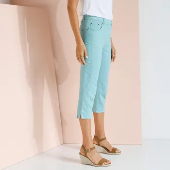 Dámské kalhoty Strečové 3/4 kalhoty v členitém střihu tyrkysová 38