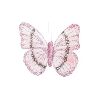 Motýl na klipu růžový