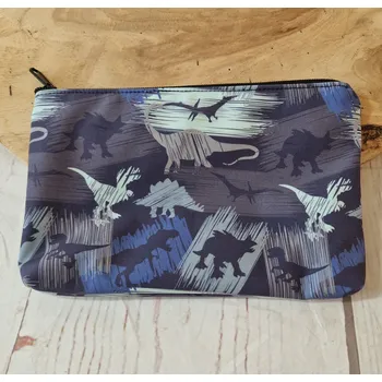 Kosmetická taška Yháček Kosmetická taštička Yháček, Dinosauři na modré