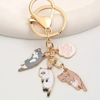 Unique Přívěsek na klíče Tři kočičky a tlapka