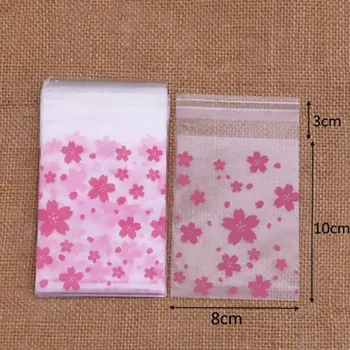 Dárková taška Dárkový sáček celofánový růžové kvítky 8 x 10 cm