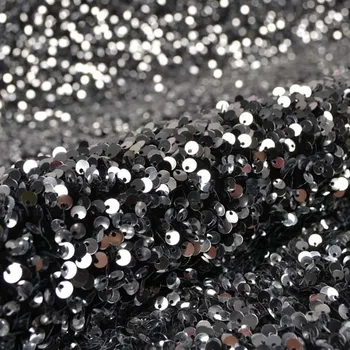 Zbytek - Flitrovaná elastická látka Pepi stříbrná