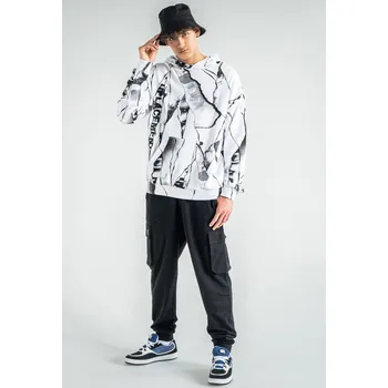 Reporter Young | Chlapecké černé tepláky s prostornými kapsami a nášivkou „UNR3AL“ - Barva ČERNÁ, Velikost 146 243-0117B-02-100-1