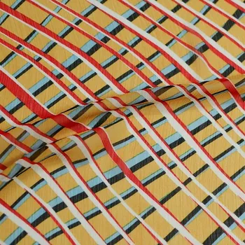 Šifon žlutý, šikmé barevné pruhy, š.140